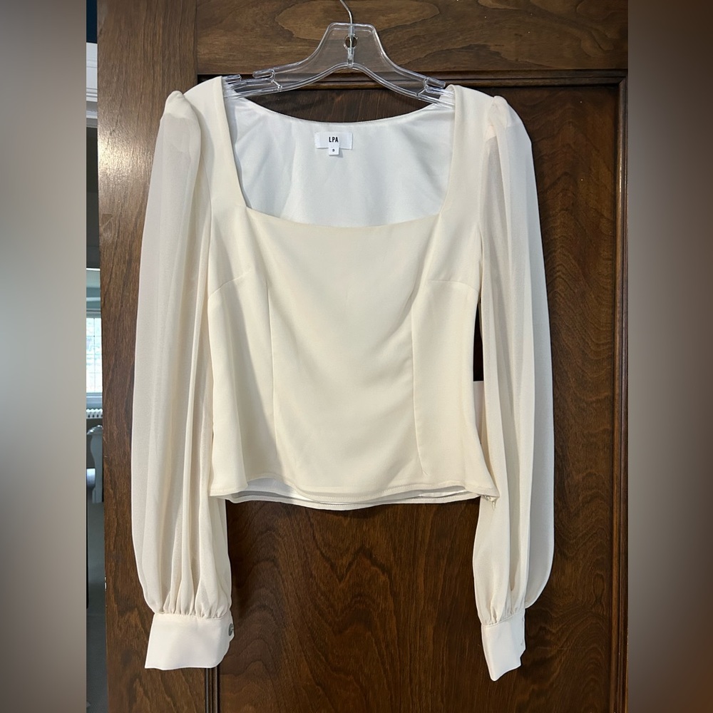 NWT beautiful cream top!